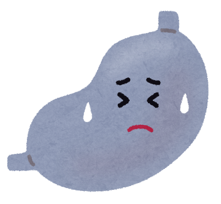 苦しそうな顔をしている胃のイラスト
