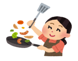 フライパンを使って料理をしている女性のイラスト