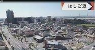 三郷中央駅の周辺にビルやマンションが立ち並んでいる、はしご車から見える三郷市の街並みの写真