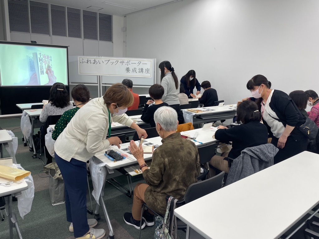 フィルムコートかけをする様子